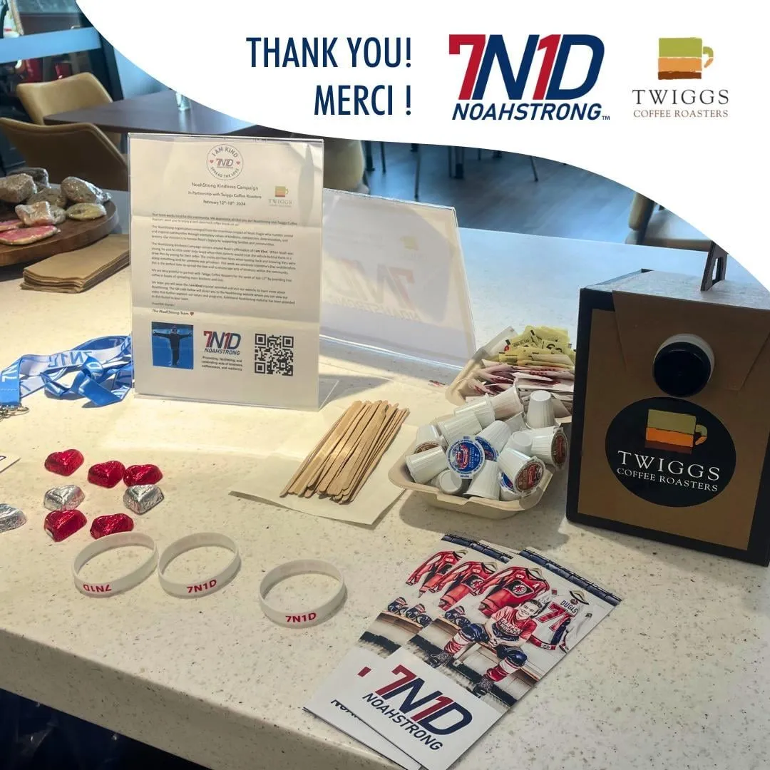 Twiggs Coffee Roasters table with NoahStrong bracelets and cards