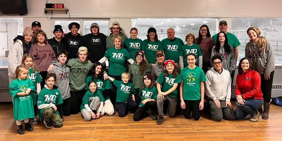 Hockey team in green 7N1D shirts for Green Shirt Day