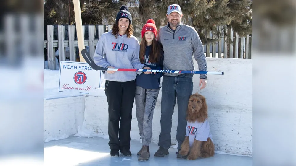 Noah's mother, sister, father and dog wearing NoahStrong merch