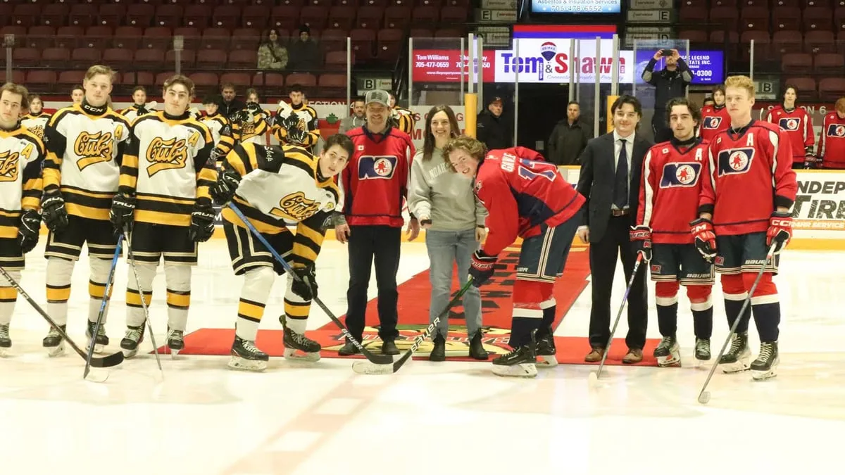 NoahStrong ceremonial puck drop at a hockey game